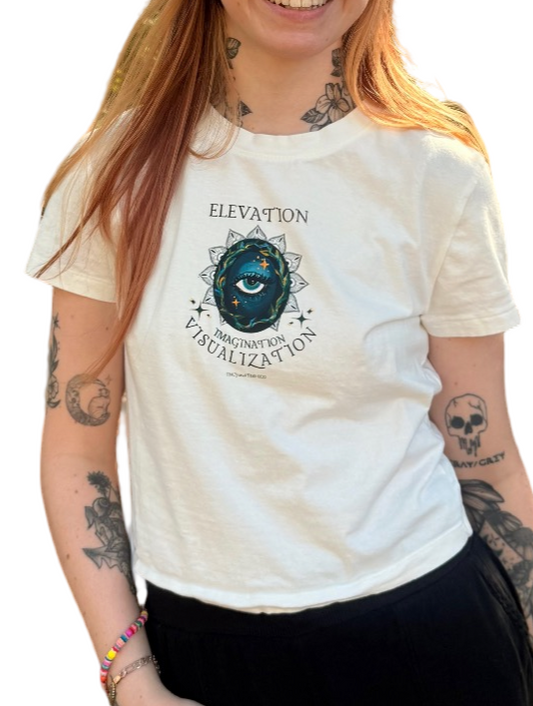 Person wearing a white t-shirt with a graphic design on a white background